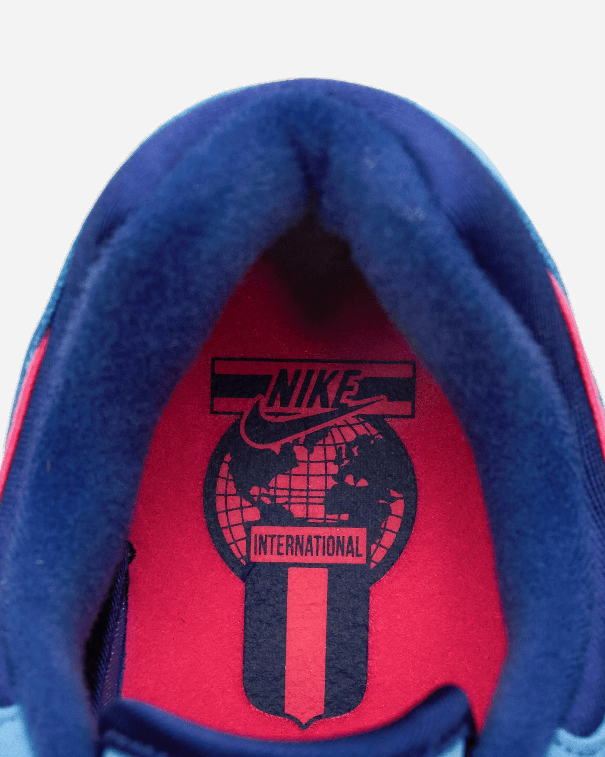 Air 180 Sneakers Universitätsblau / Knallrosa